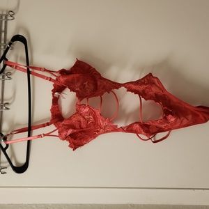 Objects size 34 B bodysuit. Sheer.